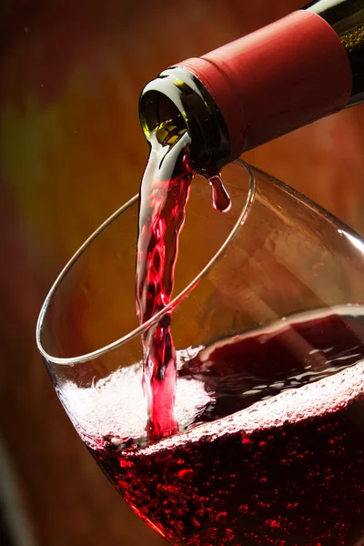 Red wine being poured into wine glass