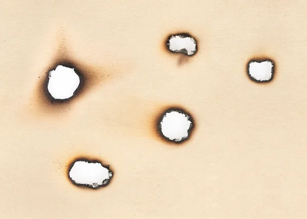 Collection of Burnt Holes in old Paper