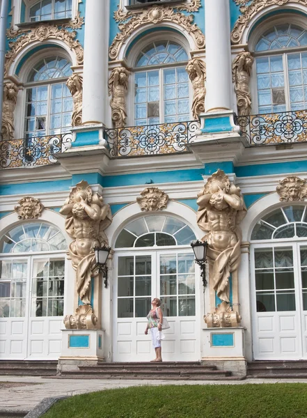 A tourist on the steps of the Great Catherine Palace. Tsarskoye