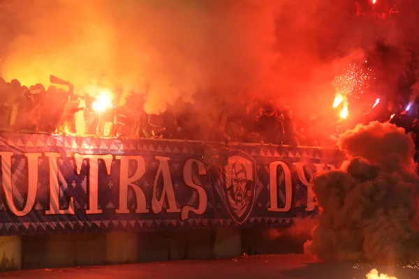 FC Dynamo Kyiv ultras (ultra supporters) burn flares