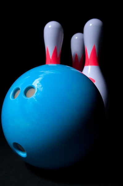 Bowling ball and bowling pins