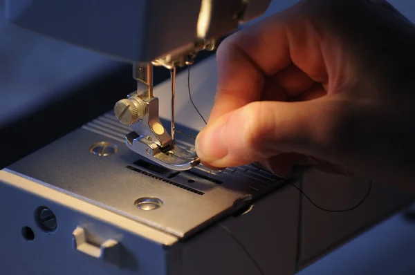 Seamstress Threading Sewing Machine