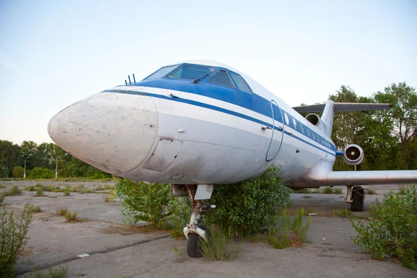 Old russian airplane is on the disused airfield