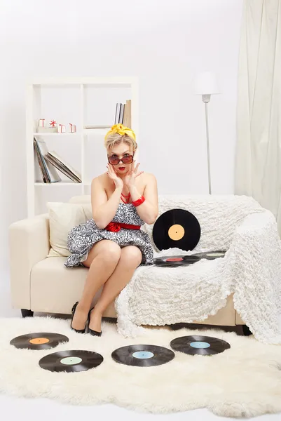 Blonde woman with vinyls