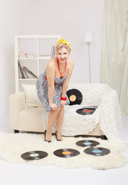 Blonde woman with vinyls