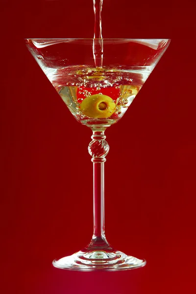 Martini on red background
