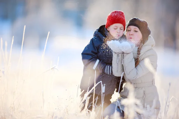 Mother and son outdoors at winter