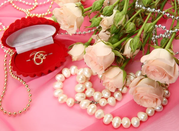 Fine roses and jewelry