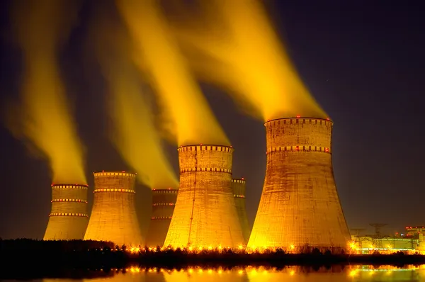 The cooling towers at night of the nuclear power generation plan