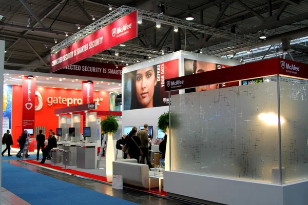 HANNOVER, GERMANY - MARCH 5: stand of McAfee on March 10, 2012 in CEBIT computer expo, Hannover, Germany. CeBIT is the world's largest computer expo