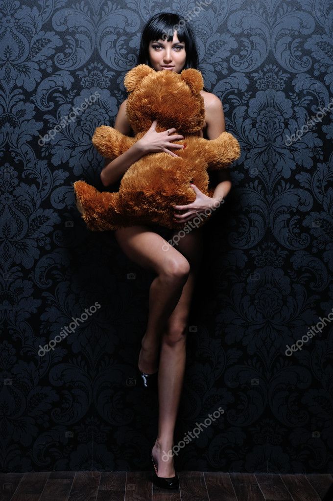 Beautiful naked girl is holding the teddy bea beautiful naked small girls