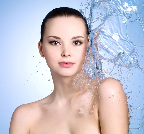 Woman with splashes of water