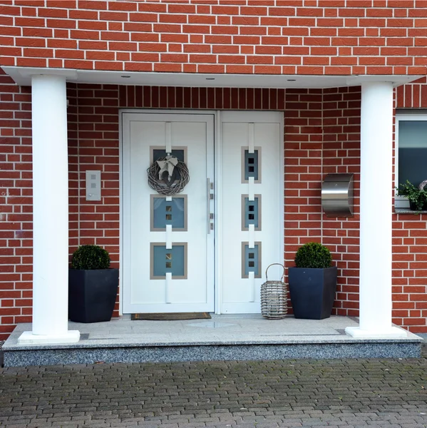 Modern, elegant front door of the house