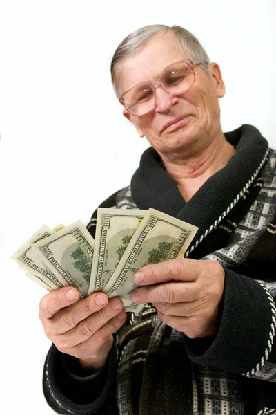 Happy old man holding dollars