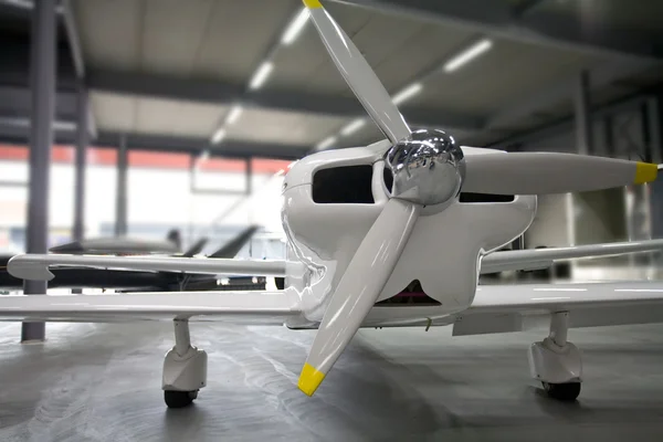 Airplane parked in hangar