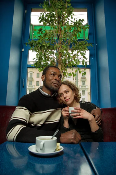 Interracial couple in cafe