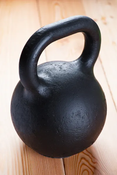 Large black cast iron weight