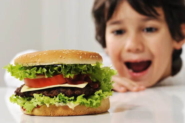 Cute child with burger