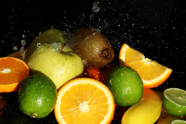 Fresh fruits and water splashes