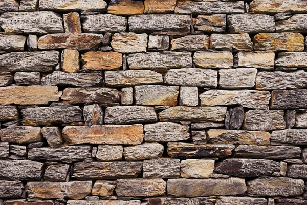 Wall built of natural stone.