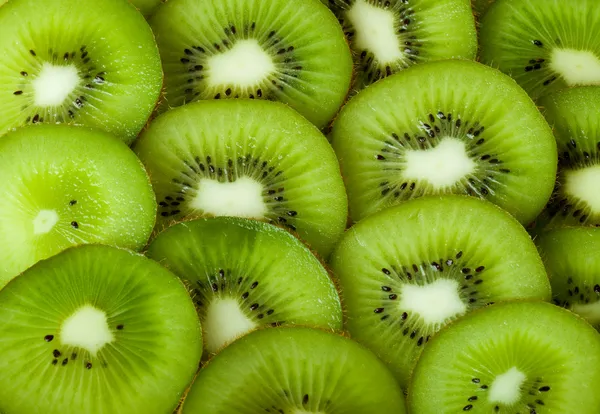 Healthy food background with beautiful green kiwi