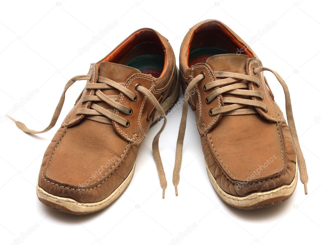 Brown man shoes isolated on a white background Photo by azgek1978