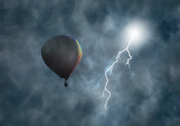 Hot-Air Balloon Among Dark Storm Clouds with Lightning