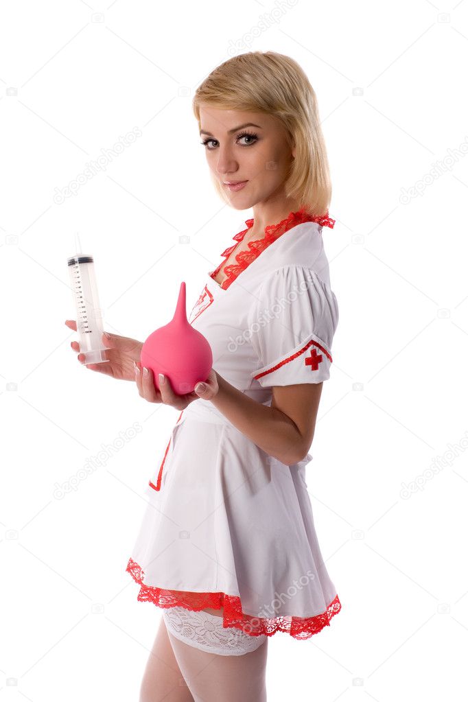 Знойная медсестра забавляется с секс игрушками