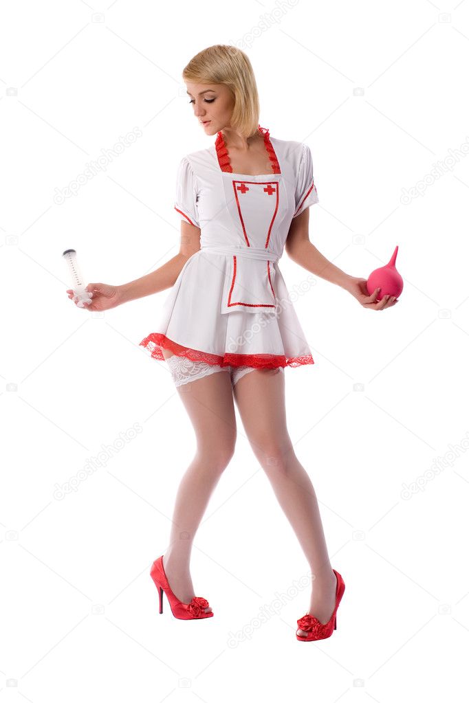 Знойная медсестра забавляется с секс игрушками