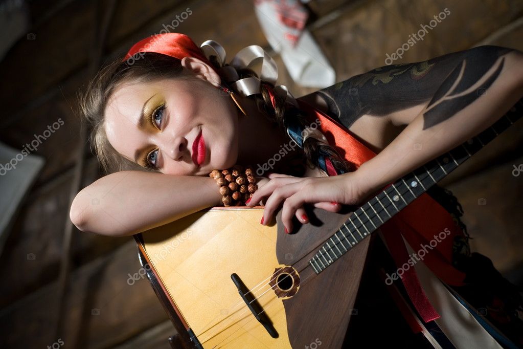 depositphotos_9235342-Russian-girl-with-a-balalaika.jpg