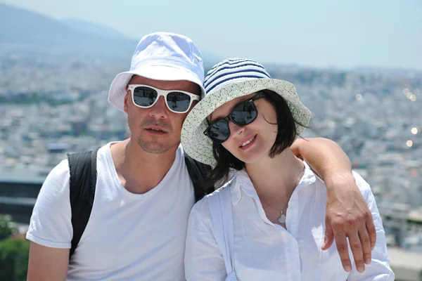 Happy young couple tourists in greece