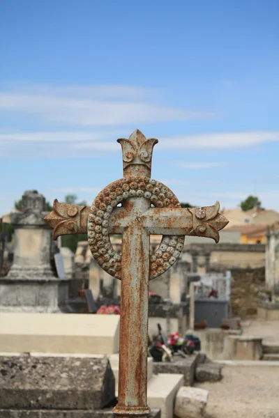Cross ornament on a grave — Stock Photo #10642195
