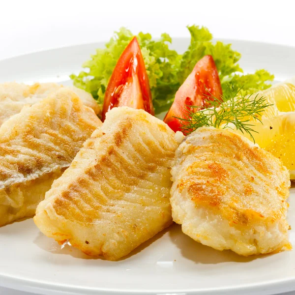 Fried fish fillet and vegetables