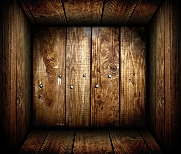 Inside an empty wooden crate. Wood box
