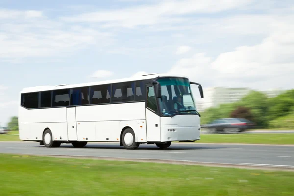 Tour bus in panning motion blur