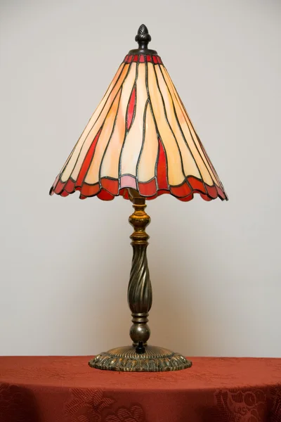 Stained glass lamp on table