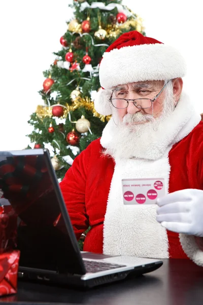 Santa paying with credit card