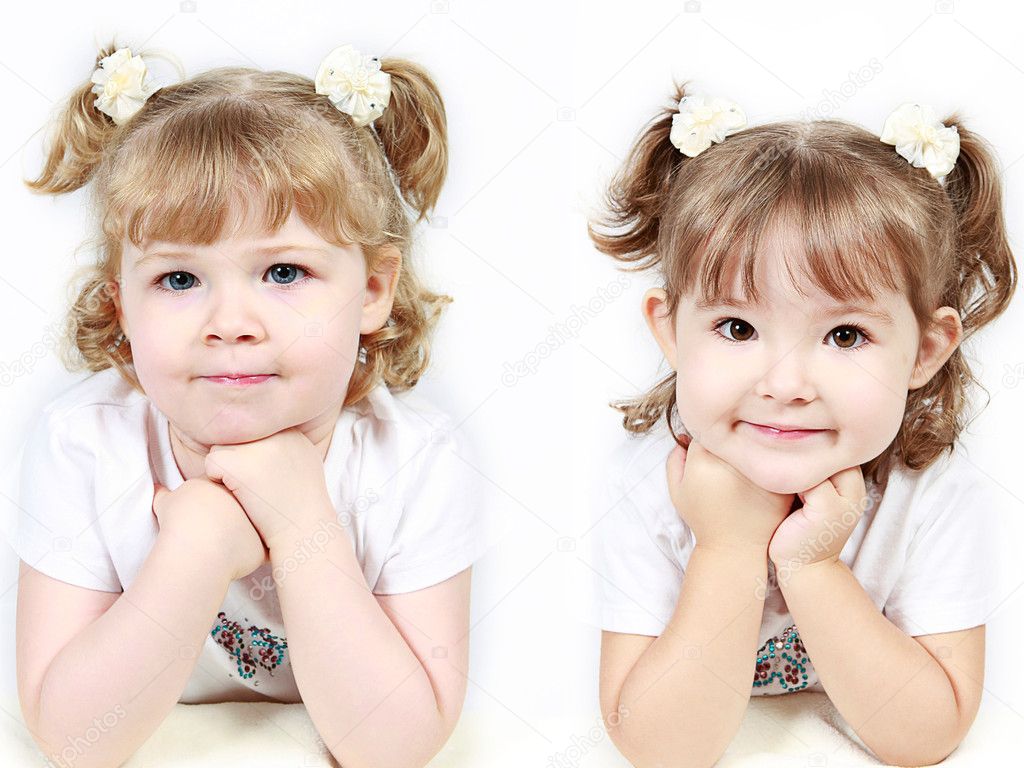 Adorable little sisters isolated on white background — Stock Photo