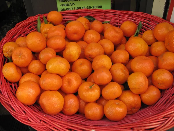 Basket of citrus on street market with clipping path