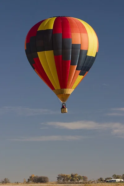 Hot air balloon over prairie