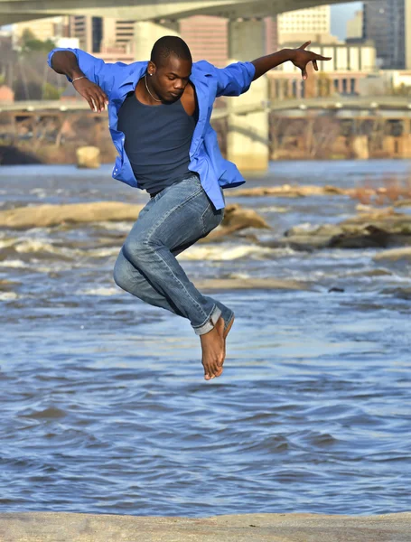 African American dancer on the James River Richmond.