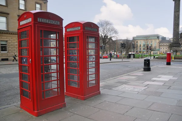 Traditional old style red phone booths