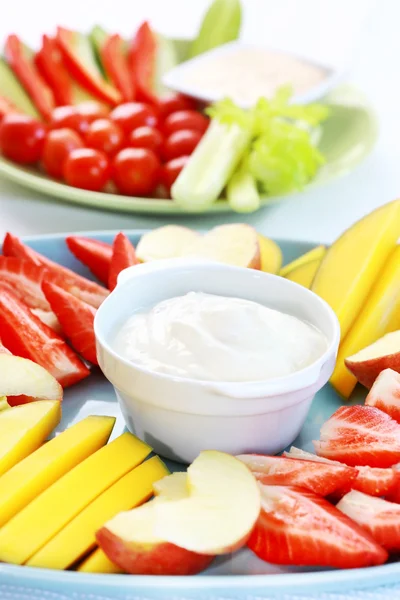Raw fruits and vegetables with dip