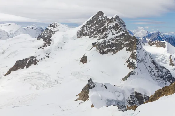 Mountain Jungfrau and mountain station Sphinx