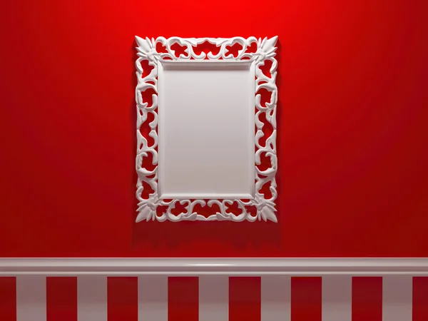 Antique white ornamented picture frame on the red wall