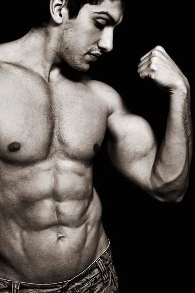 Sexy man with muscular biceps and abs — Stock Photo #9922282