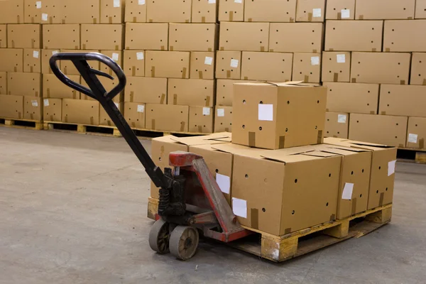 Boxes on hand pallet truck