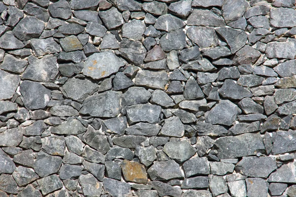 Grey natural stone wall