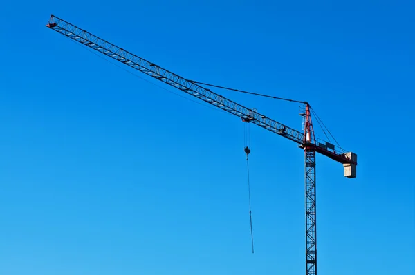 Clear sky building crane horizontal