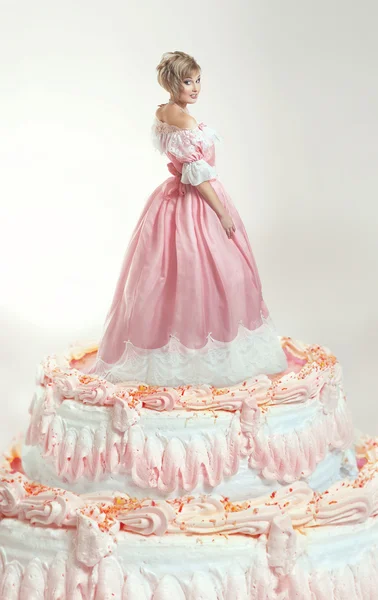 Girl and pink cake